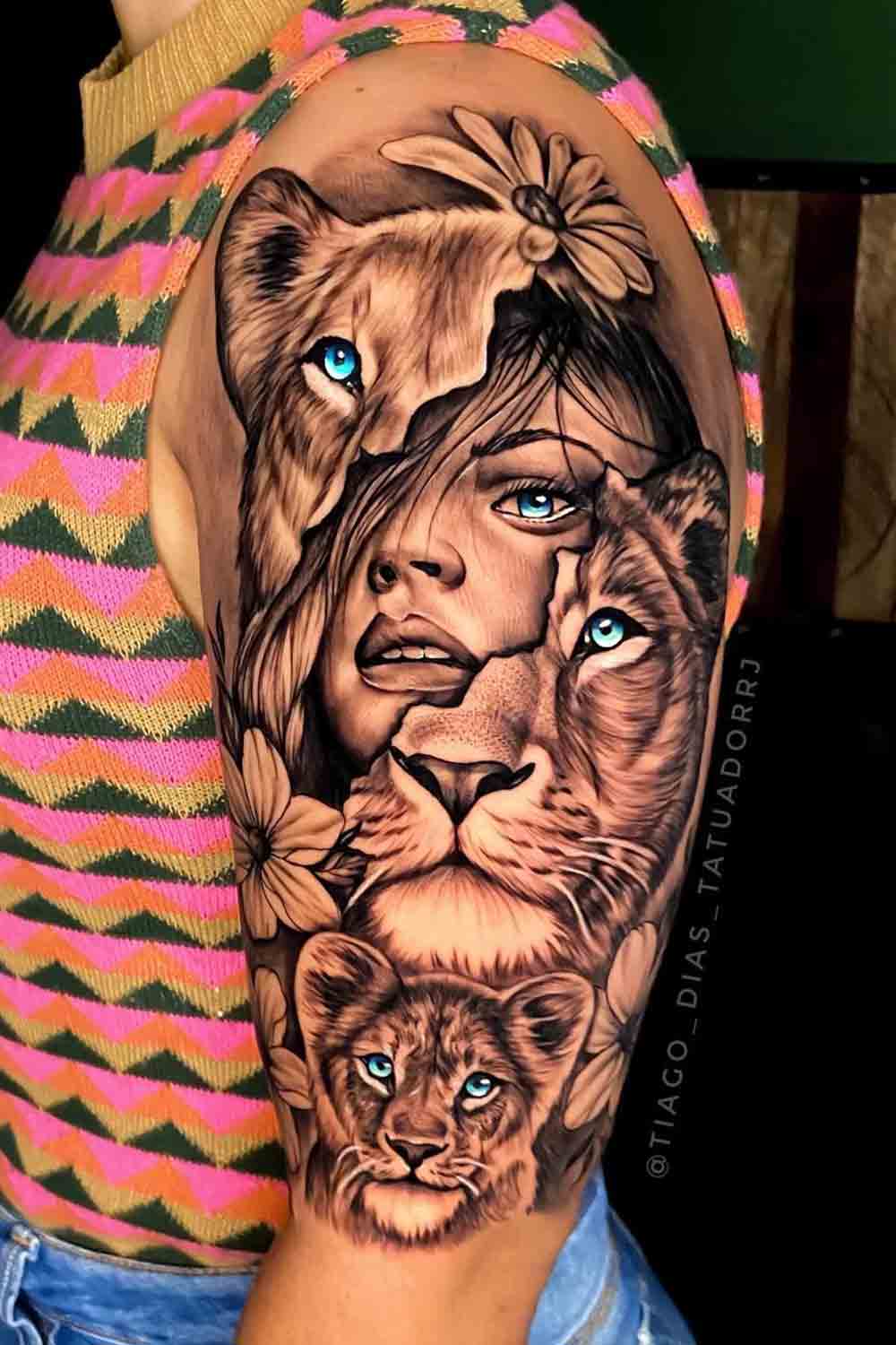 tatuagem-feminina-no-braco-de-leoa-leao-e-filhote 
